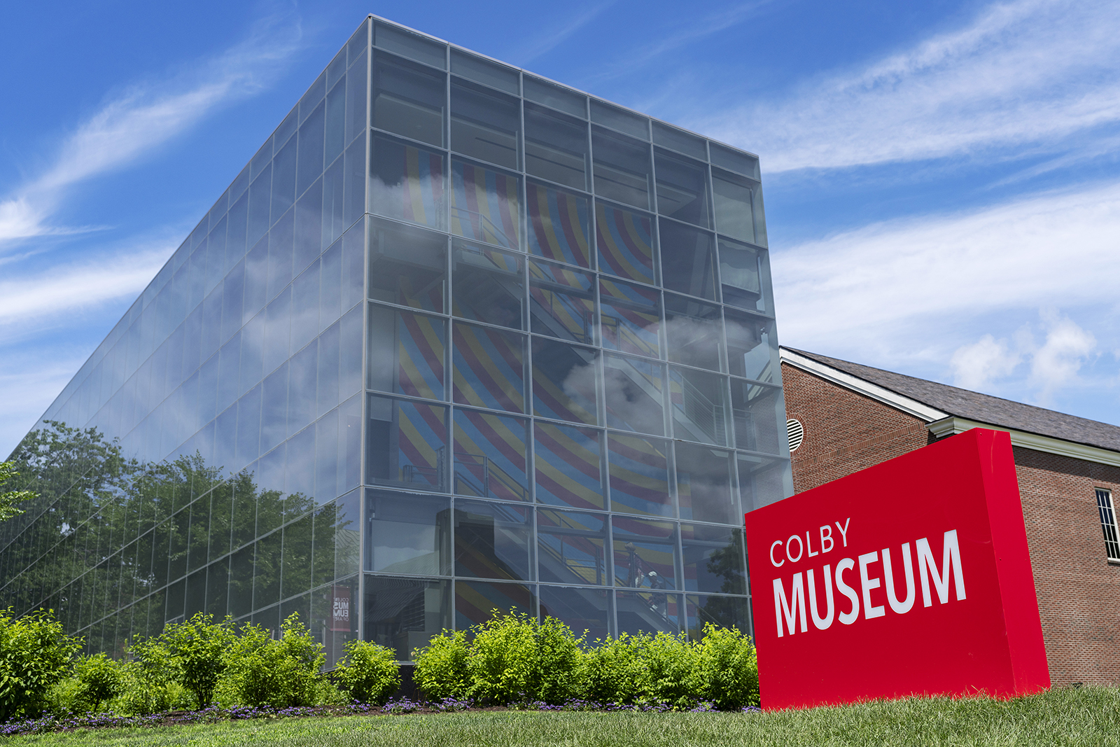 Warm toned museum exterior with brick architecture and inviting lighting